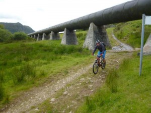 Chris going under the Llyn Cowlyd pipeline.  